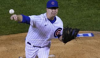 Chicago Cubs starting pitcher Alec Mills delivers during the first inning of the team&#39;s baseball game against the Cincinnati Reds on Tuesday, Sept. 8, 2020, in Chicago. (AP Photo/Charles Rex Arbogast)