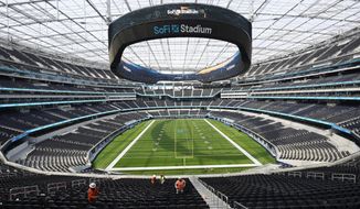 The playing field at SoFi Stadium, the future home for the Los Angeles Rams and Los Angeles Chargers football teams, is shown Friday, Sept. 4, 2020, in Inglewood, Calif. (AP Photo/Marcio Jose Sanchez)