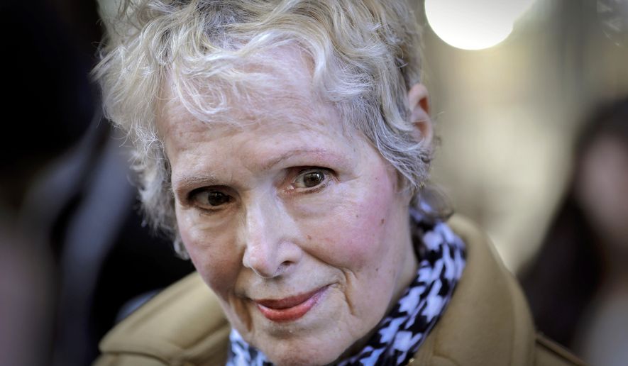 FILE - In this March 4, 2020, photo, E. Jean Carroll talks to reporters outside a courthouse in New York. The U.S. Justice Department is seeking to take over President Donald Trump&#x27;s defense in a defamation lawsuit brought by Carroll, who accused the president of raping her in a New York luxury department store in the mid-1990s. Federal lawyers asked a court Tuesday, Sept. 8, 2020, to allow a legal move that could put the American people on the hook for any money she might be awarded. She says the president&#x27;s comments, including that she was “totally lying” to sell a memoir, besmirched her character and harmed her career when he denied the rape allegations in 2019. (AP Photo/Seth Wenig, File)