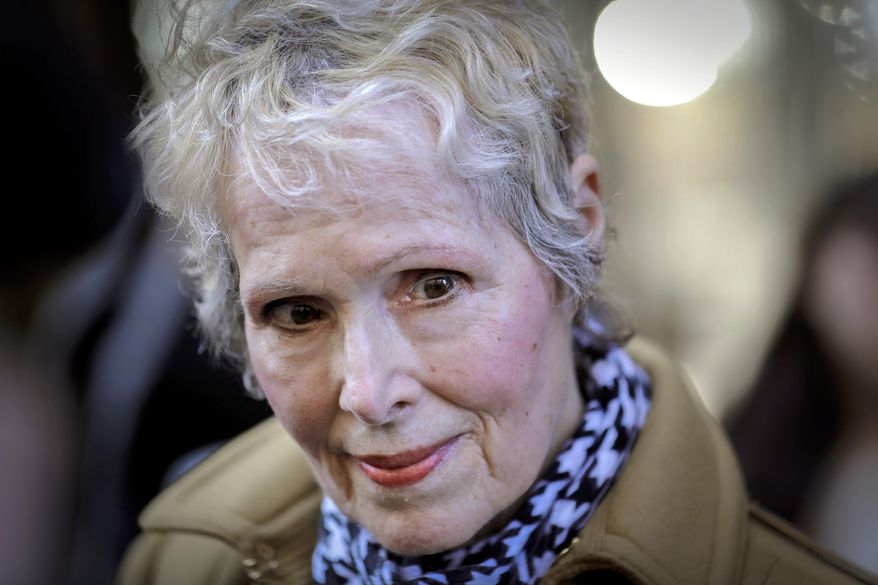 FILE - In this March 4, 2020, photo, E. Jean Carroll talks to reporters outside a courthouse in New York. The U.S. Justice Department is seeking to take over President Donald Trump&#x27;s defense in a defamation lawsuit brought by Carroll, who accused the president of raping her in a New York luxury department store in the mid-1990s. Federal lawyers asked a court Tuesday, Sept. 8, 2020, to allow a legal move that could put the American people on the hook for any money she might be awarded. She says the president&#x27;s comments, including that she was “totally lying” to sell a memoir, besmirched her character and harmed her career when he denied the rape allegations in 2019. (AP Photo/Seth Wenig, File)