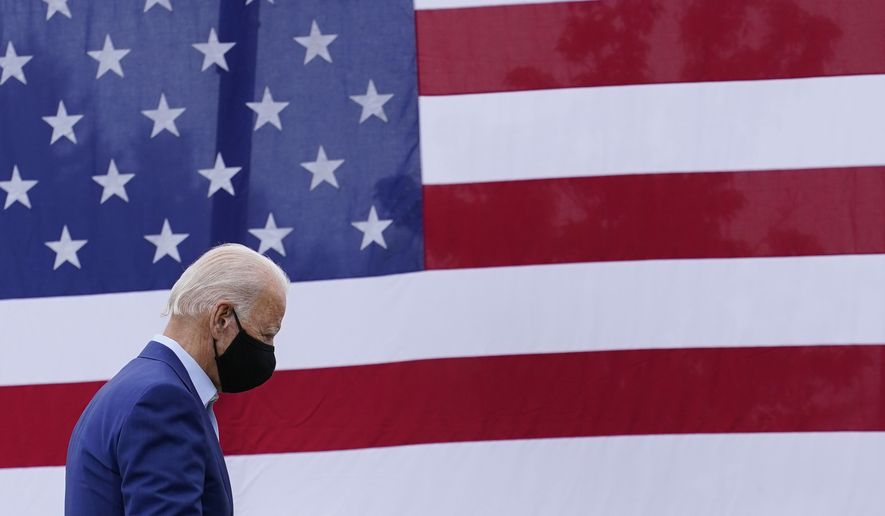 Democratic presidential candidate former Vice President Joe Biden departs after speaking at a campaign event on manufacturing American products at UAW Region 1 headquarters in Warren, Mich., Wednesday, Sept. 9, 2020. (AP Photo/Patrick Semansky)