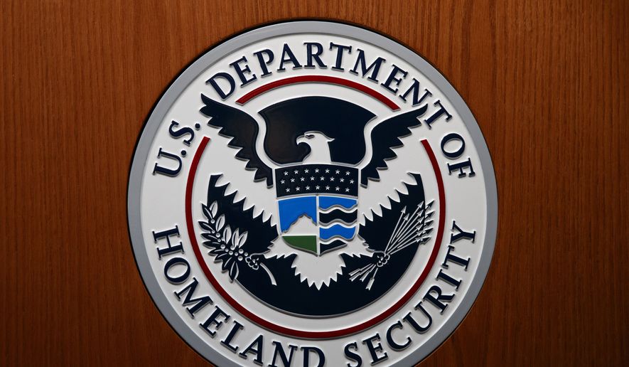 In this June 28, 2019, file photo the Department of Homeland Security (DHS) seal is seen during a news conference in Washington. (AP Photo/Carolyn Kaster, File)  **FILE**