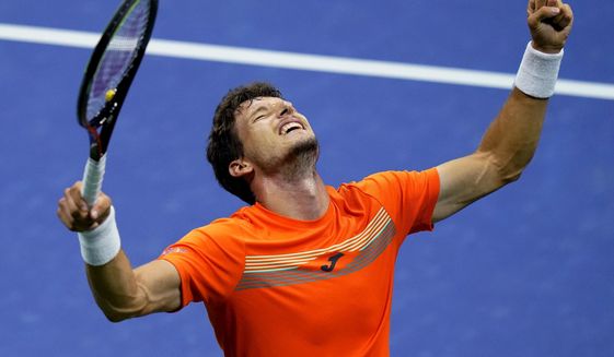 Pablo Carreno Busta, of Spain, reacts after defeating Denis Shapovalov, of Canada, during the quarterfinal round of the US Open tennis championships, early Wednesday, Sept. 9, 2020, in New York. (AP Photo/Frank Franklin II)