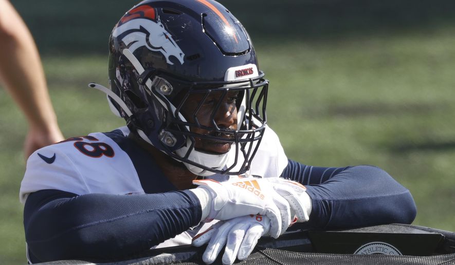FILE - Denver Broncos linebacker Von Miller (58) takes part in drills during an NFL football practice Tuesday, Aug. 18, 2020, at the team's headquarter in Englewood, Colo. The Broncos were left scrambling after losing star Von Miller to a season-ending ankle injury, denying them of the Super Bowl 50 MVP's on-field brilliance and locker room leadership. (AP Photo/David Zalubowski, File)