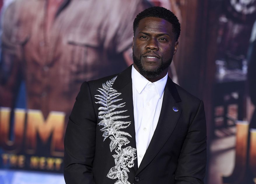 FILE - Kevin Hart poses for photographers at the premiere of "Jumanji: The Next Level," on Dec. 9, 2019, in Los Angeles. Hart will host the return of a popular telethon once spearheaded by the late Jerry Lewis. The Muscular Dystrophy Association announced Wednesday, Sept. 9, 2020, that Hart will host the MDA Kevin Hart Kids Telethon. The two-hour, star-studded virtual fundraising event will air Oct. 24. Celebrity guests will include Michael B. Jordan, Eva Longoria, Jack Black, Usain Bolt, Josh Gad and Jillian Mercado. (Photo by Jordan Strauss/Invision/AP, File)