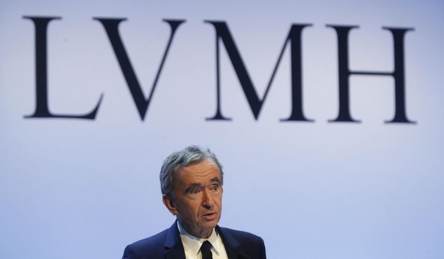 FILE - In this Jan. 28, 2020 file photo, CEO of LVMH Bernard Arnault presents the group&#x27;s 2019 results during a press conference, in Paris. The luxury goods giant is ending its takeover deal of luxury jewelry retailer Tiffany &amp;amp; Co., citing in part the threat of proposed U.S. tariffs on French goods.  (AP Photo/Thibault Camus, File)