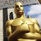 FILE - In this Feb. 21, 2015 file photo, an Oscar statue appears outside the Dolby Theatre for the 87th Academy Awards in Los Angeles. The Academy of Motion Picture Arts and Sciences laid out sweeping eligibility reforms to the best picture category intended to encourage diversity and equitable representation on and off screen beginning with the 96th Academy Awards. The announcement on Sept. 8, 2020, became a hotly debated topic on social media with some claiming it goes too far and others saying it doesn&#39;t go far enough. (Photo by Matt Sayles/Invision/AP, File)