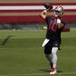 San Francisco 49ers quarterback Jimmy Garoppolo (10) passes during NFL football practice at Levi&#39;s Stadium in Santa Clara, Calif., Wednesday, Sept. 2, 2020. (AP Photo/Jeff Chiu, Pool)