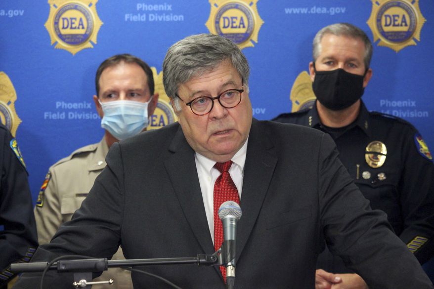 U.S. Attorney General William Barr speaks at a news conference, Thursday, Sept. 10, 2020, in Phoenix, where he announced the results of a crackdown on international drug trafficking. (AP Photo/Bob Christie)