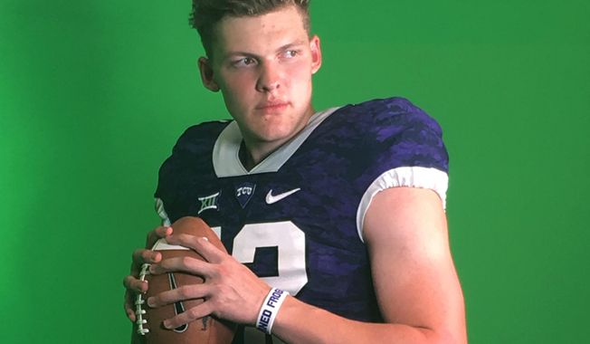 In this photo taken on July 27, 2019, German quarterback Alexander Honig poses for a photo ina TCU uniform after participating in a football camp at the Big 12 Conference school in Fort Worth, Texas. TCU offered Honig a scholarship after the workout.  Honig looks and sounds the part of big-time American college football recruit. The quarterback is nearly 6-foot-6 and 235 pounds. He has a scholarship offer to play at TCU. But the unusual part is Honig is German. It&#x27;s rare for an American college program to recruit a European as a quarterback. The 18-year-old Honig is taking his talents from Bavaria to Texas with dreams of becoming an NFL QB. (Susanne Honig via AP)