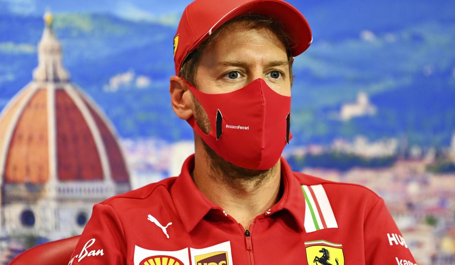 Ferrari driver Sebastian Vettel of Germany attends a media conference at the Mugello racetrack, in Scarperia, Italy, Thursday, Sept. 10, 2020, ahead of Sunday&#x27;s Formula One Grand Prix of Tuscany. (Clive Mason, Pool Photo via AP)