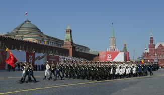 In this June 24, 2020, photo, soldiers from China&#x27;s People&#x27;s Liberation Army march toward Red Square during the Victory Day military parade marking the 75th anniversary of the Nazi defeat in Red Square in Moscow, Russia. Chinese and Russian forces will take part in joint military exercises in southern Russia later in September along with troops from Armenia, Belarus, Iran, Myanmar, Pakistan and others, China&#x27;s defense ministry announced Thursday, Sept. 10, 2020. (AP Photo/Alexander Zemlianichenko) **FILE**
