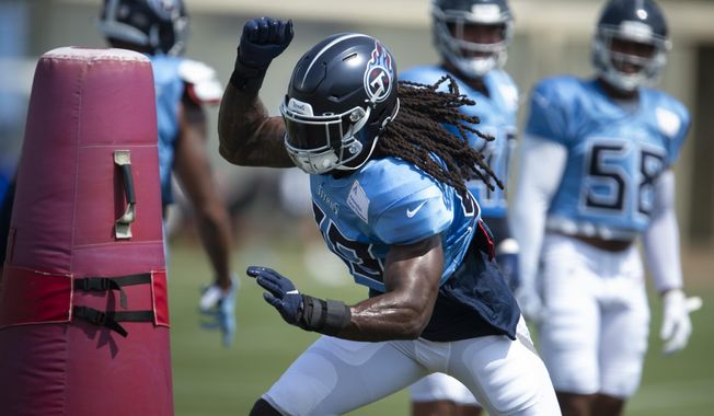 Tennessee Titans outside linebacker Jadeveon Clowney (99) runs through pass rushing drills during an NFL football practice in Nashville, Wednesday, Sept. 9, 2020. (George Walker IV/The Tennessean via AP, Pool)