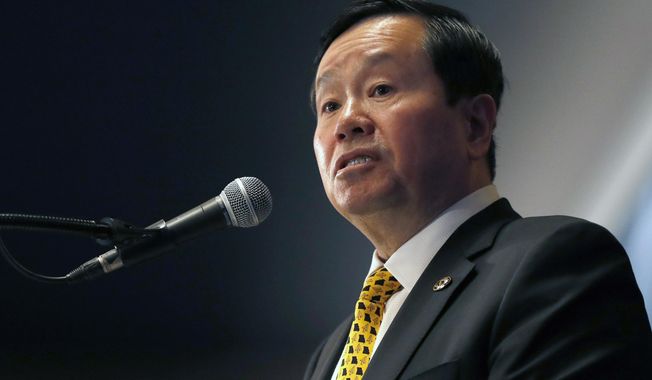 FILE - In this Dec. 10, 2019 file photo, University of Missouri system president Mun Choi speaks during a news conference in Columbia, Mo. The leader of the University of Missouri system and chancellor of its flagship Columbia campus is backtracking in the face of backlash and a possible lawsuit for blocking critical students on Twitter. Spokesman Christian Basi on Thursday, Sept. 10, 2020, said system President and Columbia Chancellor Mun Choi unblocked the students Wednesday, the same day a lawyer warned he would sue if Choi didn&#x27;t do so. (AP Photo/Jeff Roberson File)