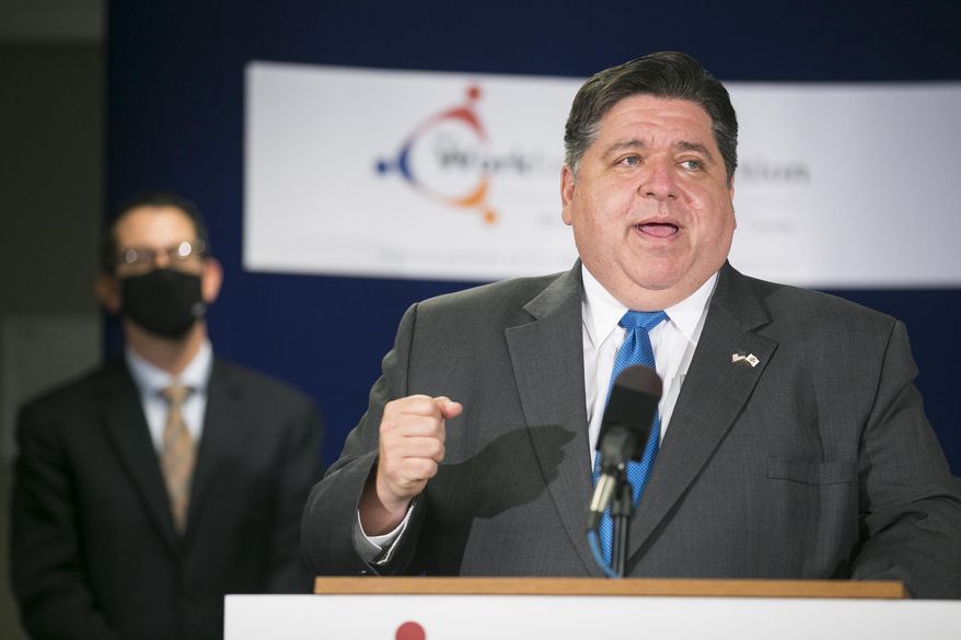 Illinois Gov. JB Pritzker answers a reporter's question after making a job training announcement at The Workforce Connection, Thursday, Sept. 10, 2020, in Rockford, Ill. (Scott P. Yates/Rockford Register Star via AP)