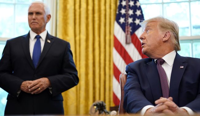President Donald Trump looks towards Vice President Mike Pence in the Oval Office of the White House on Friday, Sept. 11, 2020, in Washington. Bahrain has become the latest Arab nation to agree to normalize ties with Israel as part of a broader diplomatic push by Trump and his administration to fully integrate the Jewish state into the Middle East. (AP Photo/Andrew Harnik)