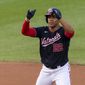 Washington Nationals Juan Soto gestures after hitting a two-run double during the first inning of the team&#39;s baseball game against the Atlanta Braves in Washington, Friday, Sept. 11, 2020. (AP Photo/Manuel Balce Ceneta)