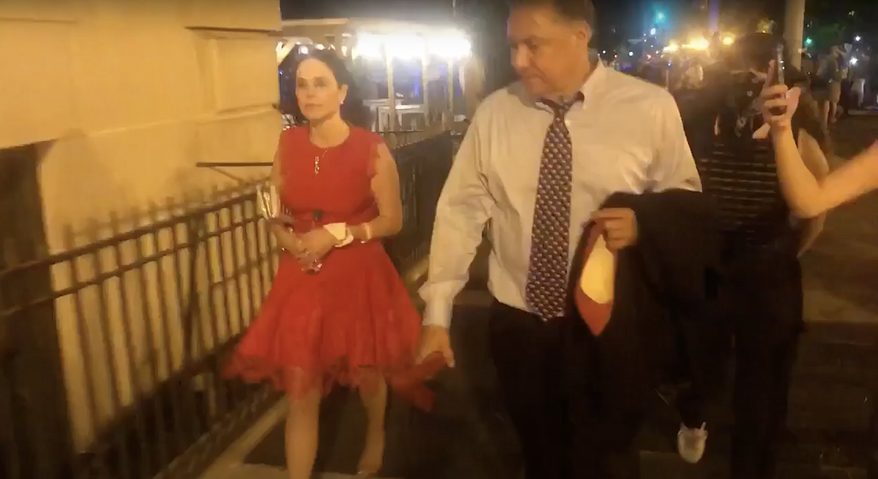 In this screen grab from a widely circulated video, Susan Young (left), a member of the D.C. GOP Council, and Republican National Committeeman Chris Ager purportedly encounter a group of protesters on Aug. 27 as they leave the White House, where they had attended the final night of the Republican National Convention and President Trump&#39;s speech accepting the reelection nomination.