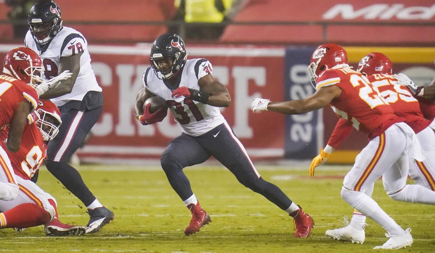 Houston Texans running back David Johnson (31) carries the ball against the Kansas City Chiefs in the second half of an NFL football game Thursday, Sept. 10, 2020, in Kansas City, Mo. (AP Photo/Jeff Roberson)