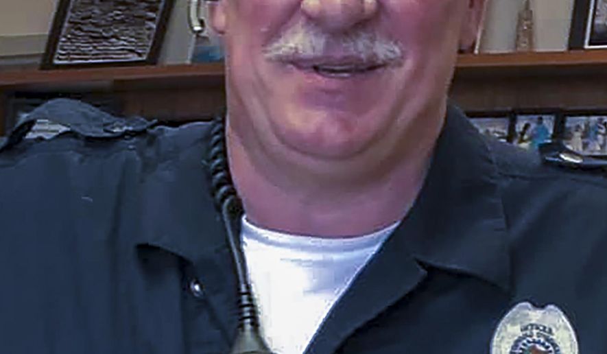 A photo provided by Tohono O&#39;odham police shows Officer Bryan Brown, who was killed Thursday, Aug. 27, 2020, by a suspect who authorities say stole his patrol vehicle and ran him over with it. The tribal nation released a statement Friday evening saying Brown dedicated his life to his country and his community.  (Tohono O&#39;odham police via AP)