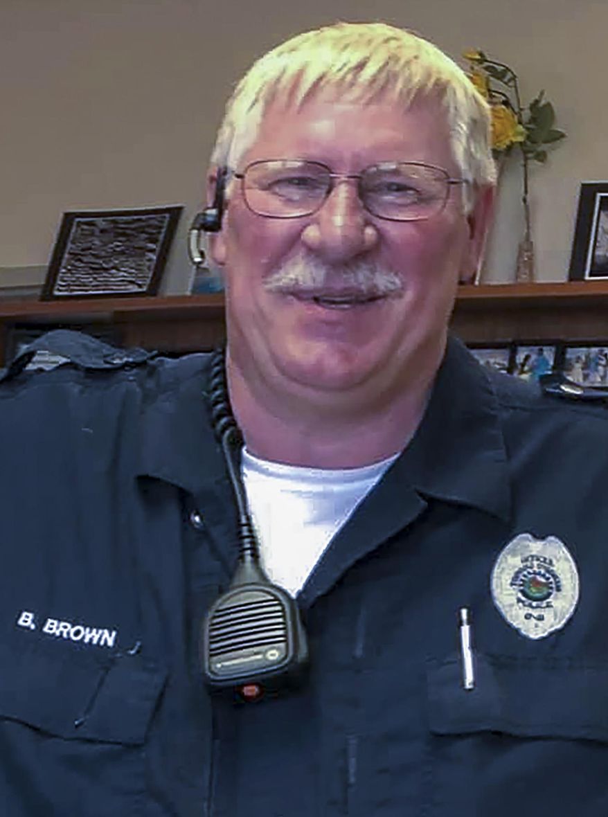 A photo provided by Tohono O'odham police shows Officer Bryan Brown, who was killed Thursday, Aug. 27, 2020, by a suspect who authorities say stole his patrol vehicle and ran him over with it. The tribal nation released a statement Friday evening saying Brown dedicated his life to his country and his community. (Tohono O'odham police via AP)