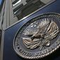 This June 21, 2013, file photo, shows the seal affixed to the front of the Department of Veterans Affairs building in Washington. (AP Photo/Charles Dharapak, File)  ** FILE **