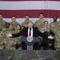 In this Nov. 28, 2019, file photo, President Donald Trump, center, with Afghan President Ashraf Ghani and Joint Chiefs Chairman Gen. Mark Milley, behind him at right, addresses members of the military during a surprise Thanksgiving Day visit at Bagram Air Field, Afghanistan. During his election campaign four years ago, Trump vowed to bring all troops home from endless wars.&quot; In recent months, he&#39;s only increased the pressure, working to fulfill his campaign promise and get forces home before Election Day. (AP Photo/Alex Brandon, File)