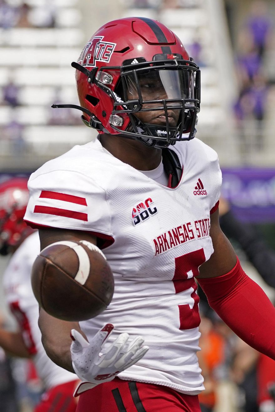 Arkansas State wide receiver Jonathan Adams Jr. celebrates after scoring a touchdown during the second half of an NCAA college football game against Kansas State, Saturday, Sept. 12, 2020, in Manhattan, Kan. (AP Photo/Charlie Riedel)