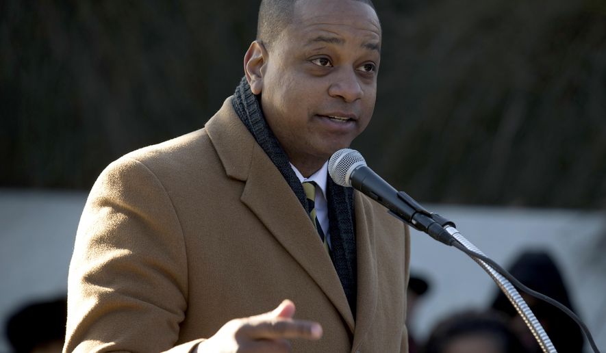 FILE - In a Monday, Jan. 20, 2020 file photo, Virginia Lt. Governor Justin Fairfax speaks during the 9th Annual wreath laying and ceremony at the Martin Luther King Jr. Memorial, in Washington. Virginia Lieutenant Governor Justin Fairfax formally kicked off his campaign for governor Saturday, Sept. 12, 2020 a year after facing two allegations of sexual assault.(AP Photo/Jose Luis Magana, File)