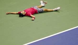 Dominic Thiem, of Austria, reacts after defeating Alexander Zverev, of Germany, in the men&#39;s singles final of the US Open tennis championships, Sunday, Sept. 13, 2020, in New York. (AP Photo/Seth Wenig)