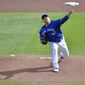 Toronto Blue Jays starting pitcher Hyun Jin Ryu throws to a New York Mets batter during the first inning of a baseball game in Buffalo, N.Y., Sunday, Sept. 13, 2020. (AP Photo/Adrian Kraus)