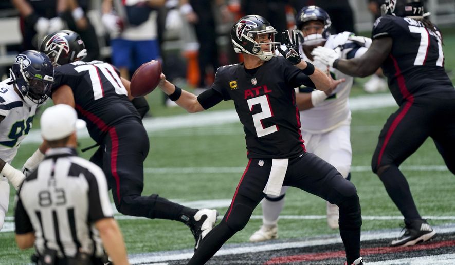 Atlanta Falcons quarterback Matt Ryan (2) works in the pocket against the Seattle Seahawks during the second half of an NFL football game, Sunday, Sept. 13, 2020, in Atlanta. (AP Photo/John Bazemore)