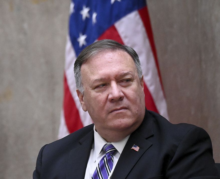 Secretary of State Mike Pompeo listens during the third annual U.S.-Qatar Strategic Dialogue at the State Dept., Monday, Sept. 14, 2020 in Washington. (Erin Scott/Pool via AP)