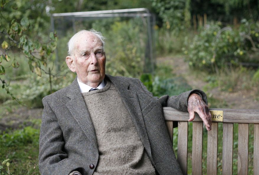 Peter Padfield sits in his garden in Woodbridge, Suffolk, England, Wednesday Sept. 9, 2020. In 1957 Padfield was a crew member on the sailing ship the Mayflower II, a replica of the square-rigged English merchant vessel that carried a group of dissatisfied Protestants across the Atlantic Ocean in 1620. (AP Photo/Stefan Cottrell)