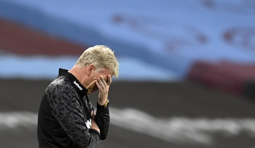 West Ham's manager David Moyes reacts during the English Premier League soccer match between West Ham United and Newcastle United at the London Stadium in London, Saturday, Sept. 12, 2020. (Michael Regan/Pool via AP)
