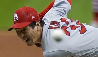 St. Louis Cardinals starting pitcher Kwang Hyun Kim throws during the first inning of the first game of a baseball doubleheader against the Milwaukee Brewers Monday, Sept. 14, 2020, in Milwaukee. (AP Photo/Morry Gash)