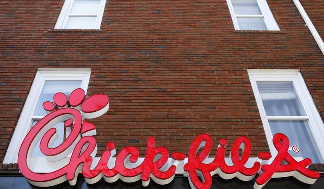 In this Oct. 30, 2018, photo, Chick-fil-A signage is displayed in downtown Athens, Ga. (Joshua L. Jones/Athens Banner-Herald via AP) **FILE**