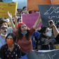 Members of Women Democratic Front chant slogans during a rally to condemn the incident of rape on a deserted highway, in Islamabad, Pakistan, Saturday, Sept. 12, 2020. Pakistani police said they detained 15 people for questioning after two armed men allegedly gang raped a woman in front of her children after her car broke down on a deserted highway near the eastern city of Lahore. (AP Photo/Anjum Naveed)
