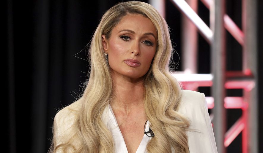 FILE - Paris Hilton speaks during the YouTube TCA 2020 Winter Press Tour in Pasadena, Calif. on Jan. 18, 2020. Hilton says she “finally feels free” after discussing her time at a Utah boarding school as a teenager. She opens up about her experience in a new documentary “This is Paris,” debuting for free on Sept. 14 on Hilton’s YouTube channel. (Photo by Willy Sanjuan/Invision/AP, File)