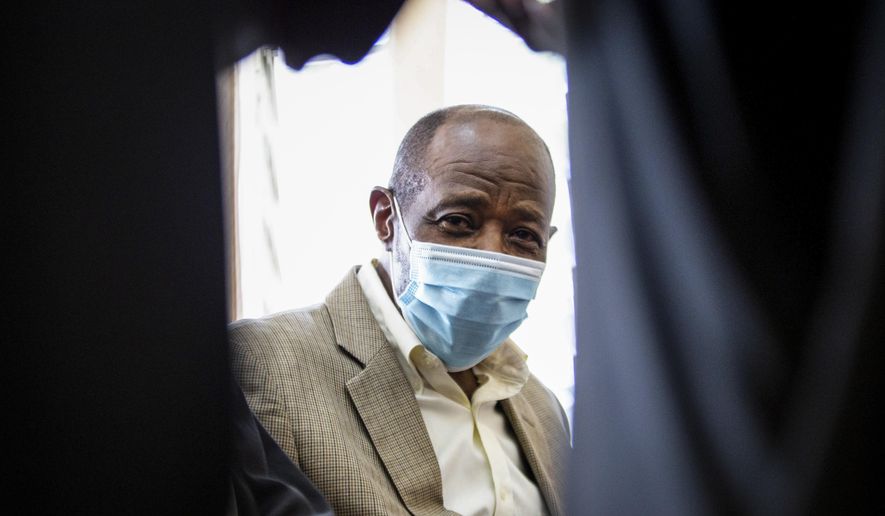Paul Rusesabagina, who inspired the film &amp;quot;Hotel Rwanda&amp;quot; for saving people from genocide, appears at the Kicukiro Primary Court in the capital Kigali, Rwanda Monday, Sept. 14, 2020. Rusesabagina became famous for protecting more than 1,000 people as a hotel manager during Rwanda&#39;s 1994 genocide and was awarded the U.S. Presidential Medal of Freedom in 2005 but Rwandan authorities accused him of supporting the armed wing of his opposition political platform, which has claimed responsibility for deadly attacks inside Rwanda. (AP Photo)