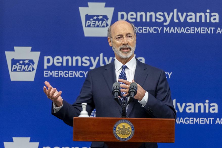 In this May 29, 2020, file photo, Pennsylvania Gov. Tom Wolf meets with the media at The Pennsylvania Emergency Management Agency (PEMA) headquarters in Harrisburg, Pa. (Joe Hermitt/The Patriot-News via AP, File)