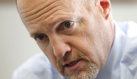 In this Tuesday, Oct. 19, 2010, file photo, CNBC &quot;Mad Money&quot; TV show host Jim Cramer speaks during an interview with The Associated Press at Tulane University in New Orleans. (AP Photo/Gerald Herbert, File)