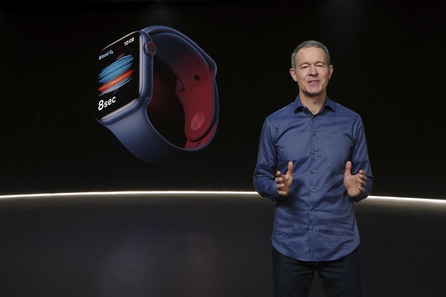 In this still image provided by Apple from the keynote video of a special event at Apple Park in Cupertino, Calif., Apple&#39;s Chief Operating Officer Jeff Williams unveils Apple Watch Series 6 on Tuesday, Sept. 15, 2020. Apple is introducing the cheaper version of its smart watch in its latest attempt to broaden the appeal of its trend-setting products while more consumers are forced to scrimp during ongoing fallout from the pandemic. (Apple via AP)