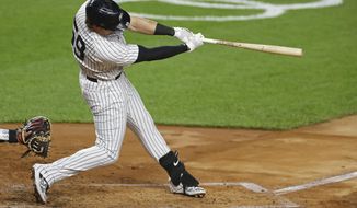 CORRECTS TO SECOND INNING-New York Yankees&#x27; Luke Voit hits a three-run home run during the second inning of a baseball game against the Toronto Blue Jays on Tuesday, Sept. 15, 2020, in New York. (AP Photo/Adam Hunger)
