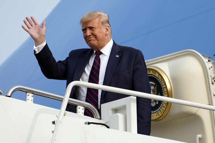 President Donald Trump arrives at Philadelphia International Airport to attend an ABC News town hall at National Constitution Center, Tuesday, Sept. 15, 2020, in Philadelphia. (AP Photo/Evan Vucci)