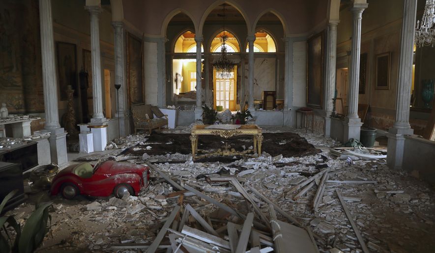 Debris from the ceiling and walls cover the floor of a room in the 150-year-old Sursock Palace that was damaged by the Aug. 4 explosion that hit the seaport of Beirut, Lebanon, Monday, Sept. 14, 2020. Restoring Beirut&#39;s architectural heritage from the August blast will take hundreds of millions of dollars and costs will quickly rise if no action is taken ahead of the onset of the rainy season in less than two months time, international experts announced Tuesday. (AP Photo/Bilal Hussein)