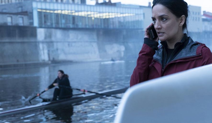 This image released by Peacock shows Archie Panjabi as Kendra Malley in a scene from "Departure." Panjabi plays an aviation investigator and single mom who is called in to solve the strange disappearance of a jetliner en route to London in the six-part series premiering on Sept. 17 on the Peacock streaming platform. (Stephen Scott/Shaftesbury/Greenpoint Productions/Peacock via AP)