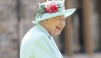 In this July 17, 2020 file photo, Britain&#39;s Queen Elizabeth smiles after awarding Captain Sir Thomas Moore his knighthood during a ceremony at Windsor Castle in Windsor, England. The former British colony of Barbador, once known as Little England, announced Tuesday, Sept. 15, that it plans to replace the monarch with its own head of state in time for next years 55th independence anniversary. (AP Photo/Chris Jackson, File)  **FILE**
