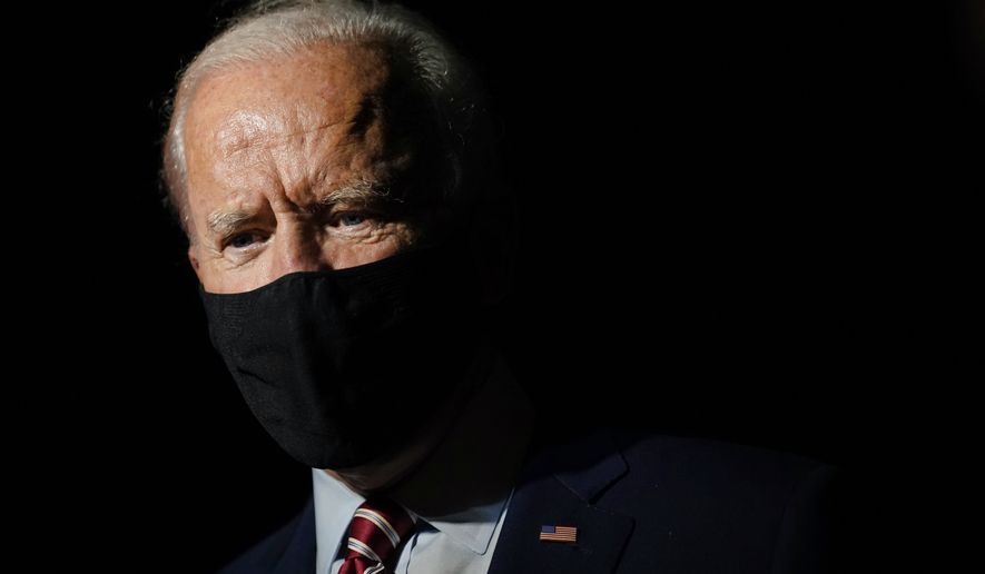 Democratic presidential candidate former Vice President Joe Biden speaks with reporters before boarding a plane at Orlando International Airport in Orlando, Fla., Tuesday, Sept. 15, 2020. Biden is returning to his home in Delaware after attending campaign events in Florida. (AP Photo/Patrick Semansky)