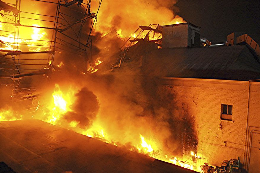 A five-story apartment complex that was to provide housing for low-income veterans is ravaged by fire early Wednesday, Sept. 16, 2020 in East Los Angeles, just months before it was scheduled to open. Some 150 Los Angeles County firefighters were dispatched to the blaze before dawn. The first to arrive around 1 a.m. found it fully engulfed in flames. The cause was not immediately known. (AP Photo/Rick McClure)